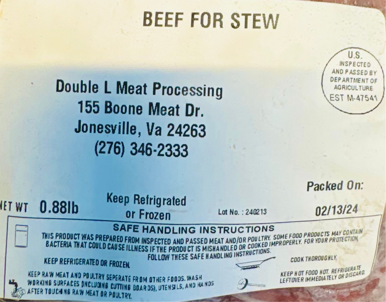 Close-up of USDA-inspected label on Beef For Stew from Ramsey’s Meat Market, showing weight and packaging date