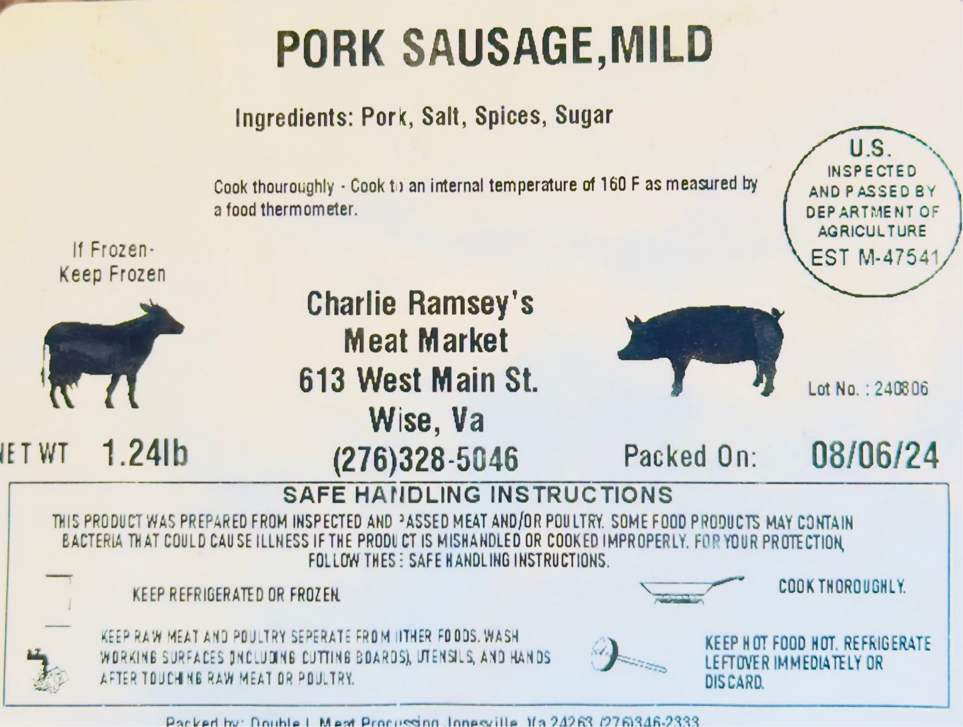 Close-up of USDA-inspected label on Pork Sausage Mild from Ramsey’s Meat Market, showing weight and packaging date.