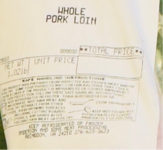 Close-up of USDA-inspected label on Whole Pork Loin from Ramsey’s Meat Market, showing weight and packaging date.