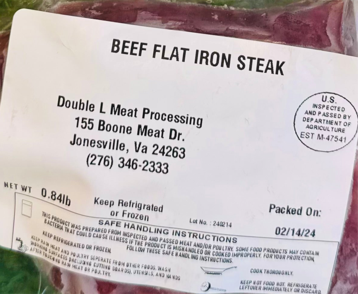 Close-up of USDA-inspected label on Beef Flat Iron Steak from Ramsey’s Meat Market, showing weight and packaging date.